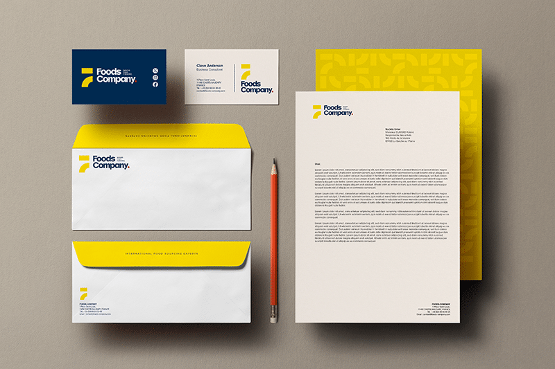Mise en situation de la papeterie du nouveau logo de la marque Foods Company réalisé par l'agence de communication Comwell en Vendée